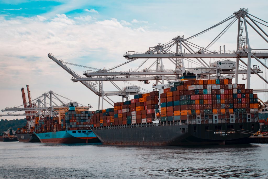 cargo ships managed transportation freight crane harbor