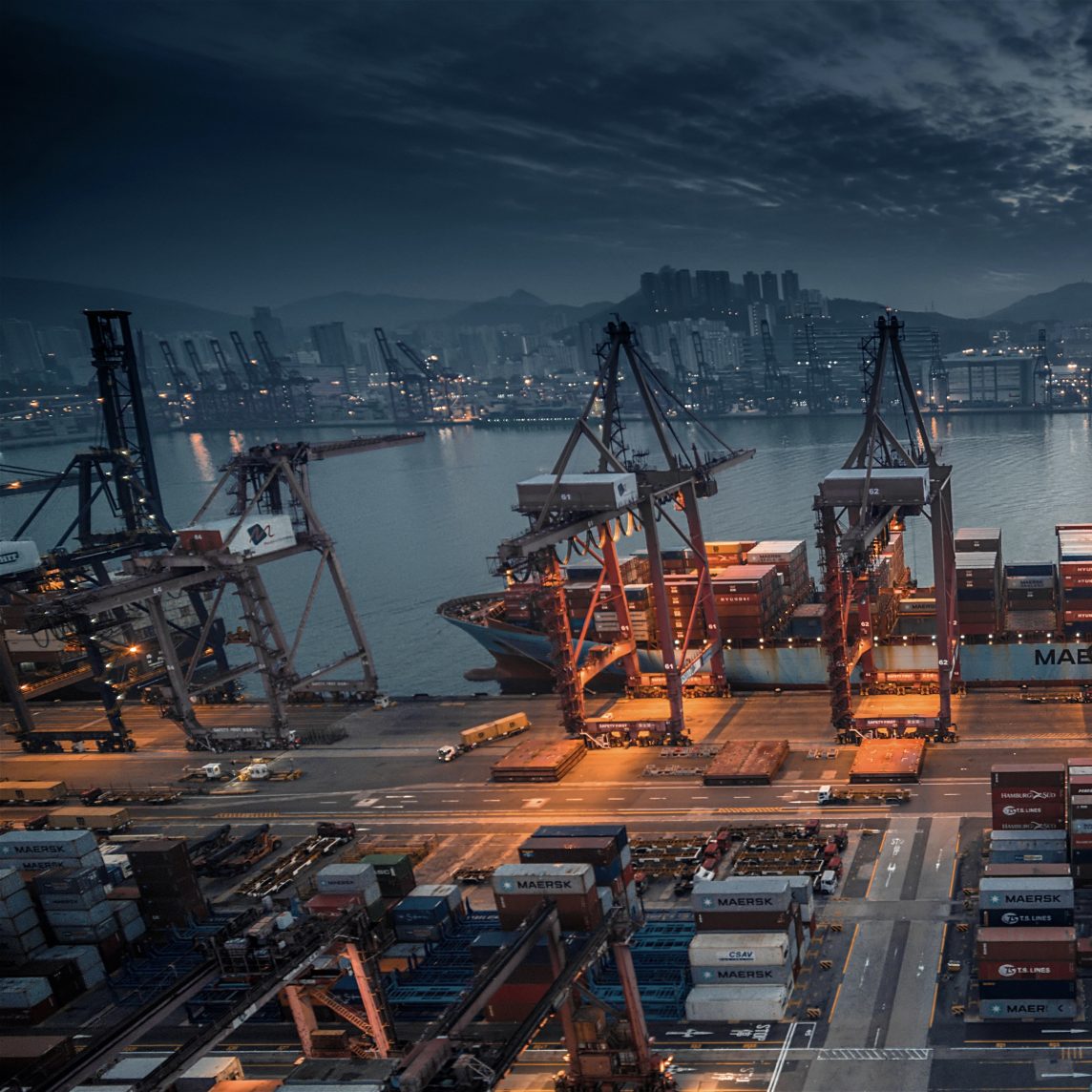A shipping port at night in Hong Kong. BRICS exports have risen over the last several decades.