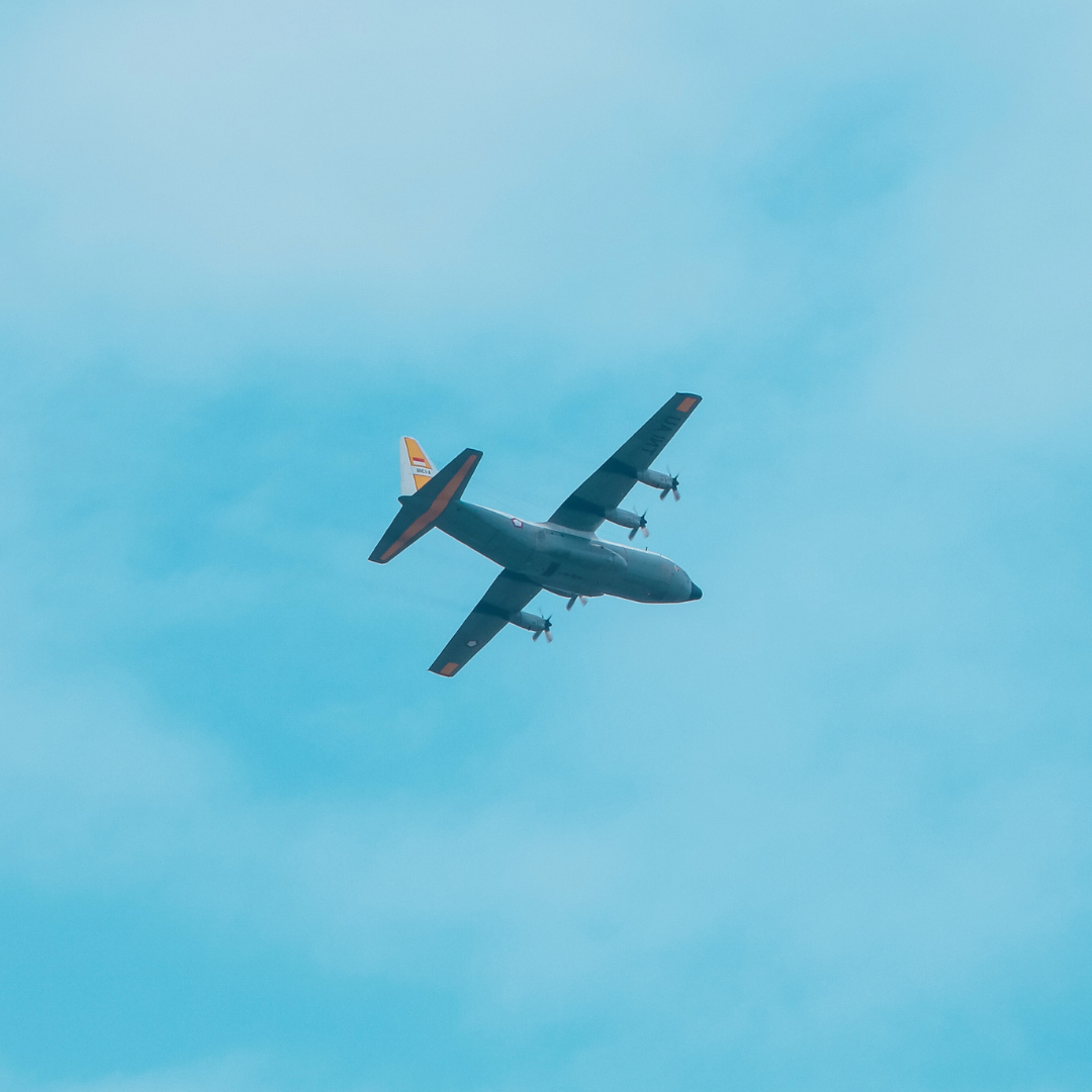 Cargo plane flying through the sky.