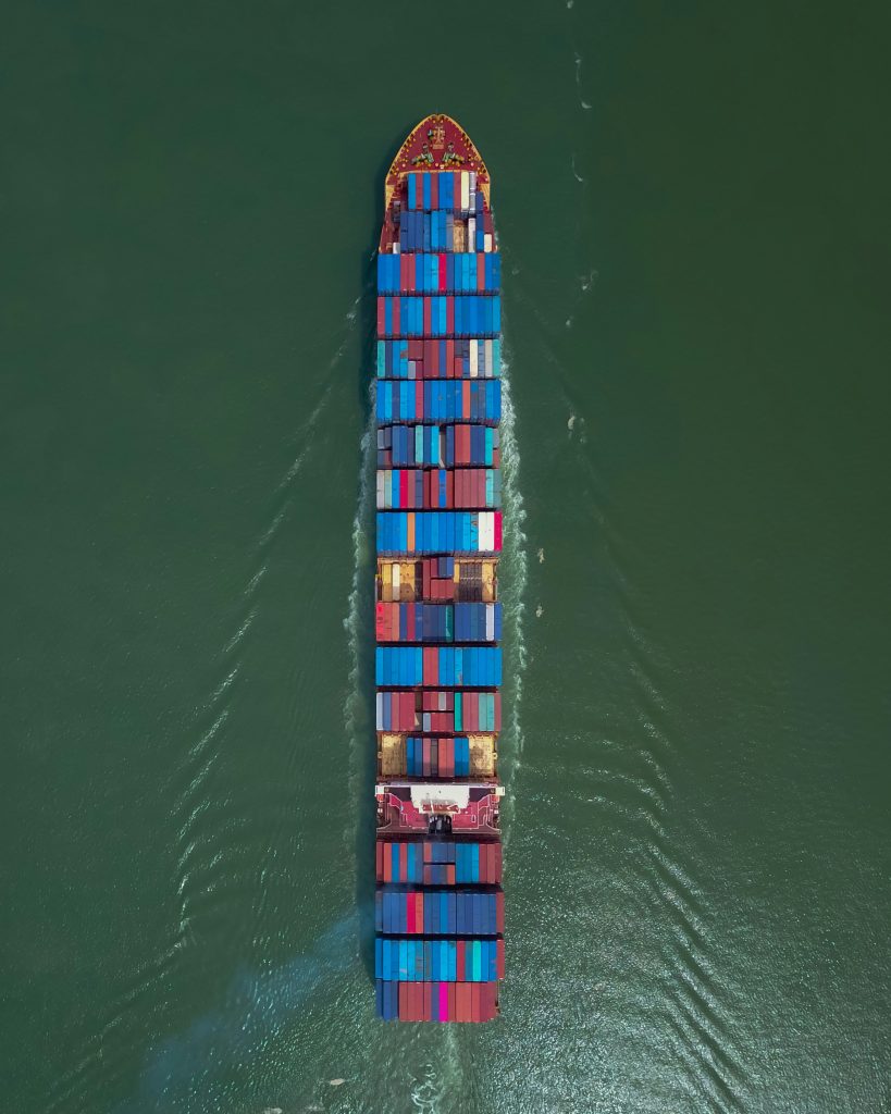 Aerial view of container ship at sea.